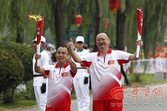 十四运会和残特奥会火炬在咸阳传递 68名火炬手接力传递