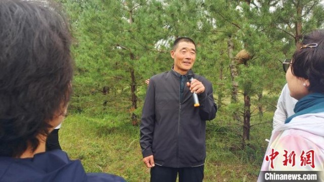 退伍军人马云平：24年鏖战沙海 种出“绿色长城”